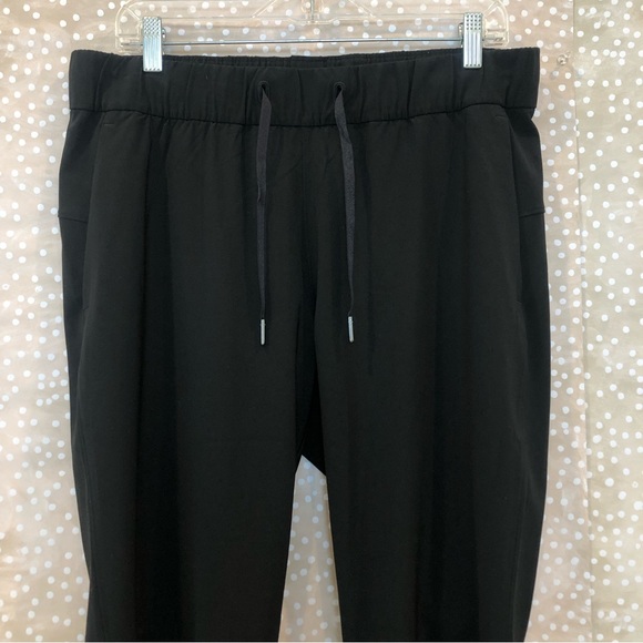 Lululemon On The Fly Pant 28” Black Size 10 Drawstring Pockets Style W5AHOS - Picture 3 of 10